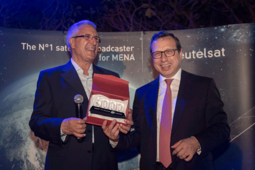 Mohamed Said Zerari (left), OSN, receiving Eutelsat's special award from Ali Korur (right), CEO of Eutelsat's Middle East