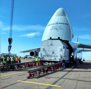 Offloading the AsiaSat 9 container from a transport aircraft at the Baikonur airport Photo courtesy of ILS